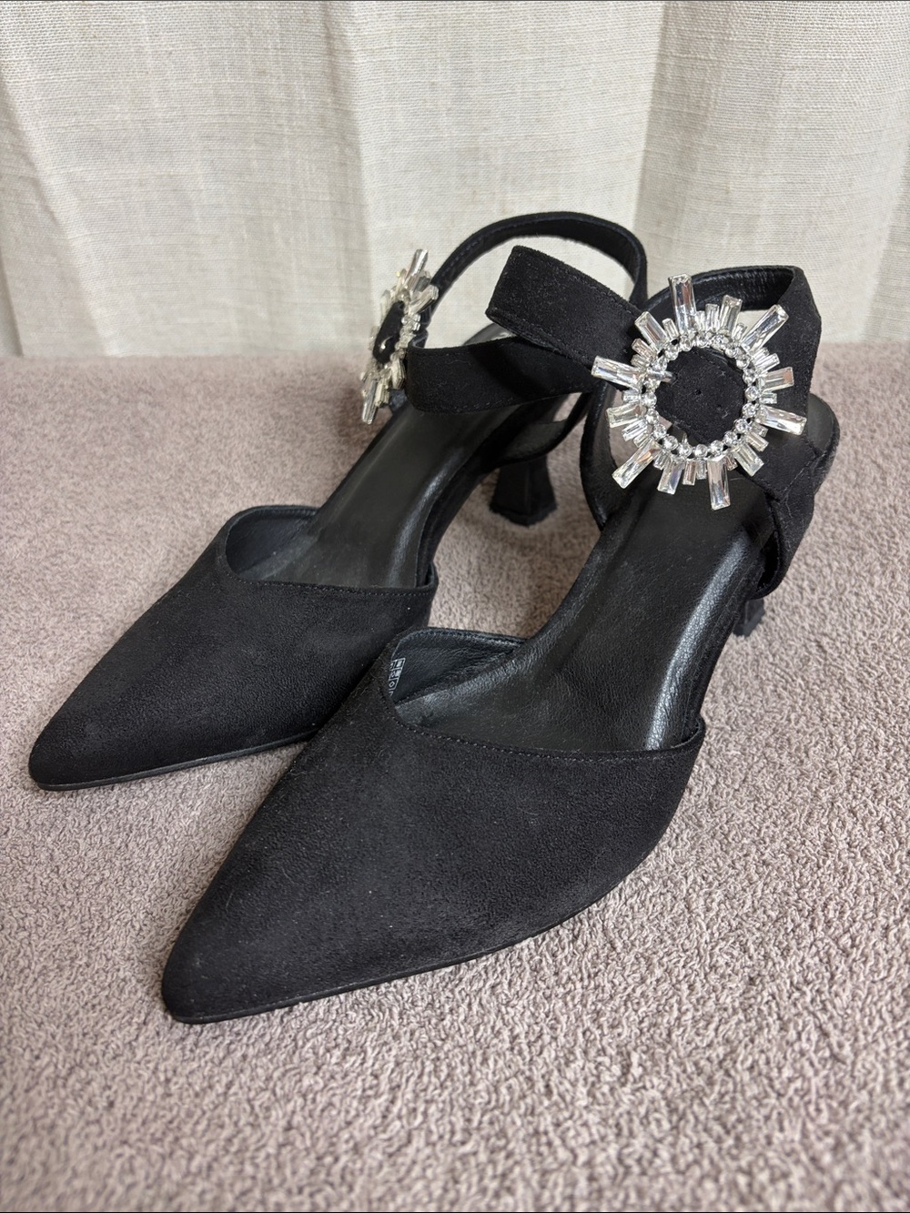 Avenue Black Pointed-Toe Heels with Crystal Sunburst Buckles